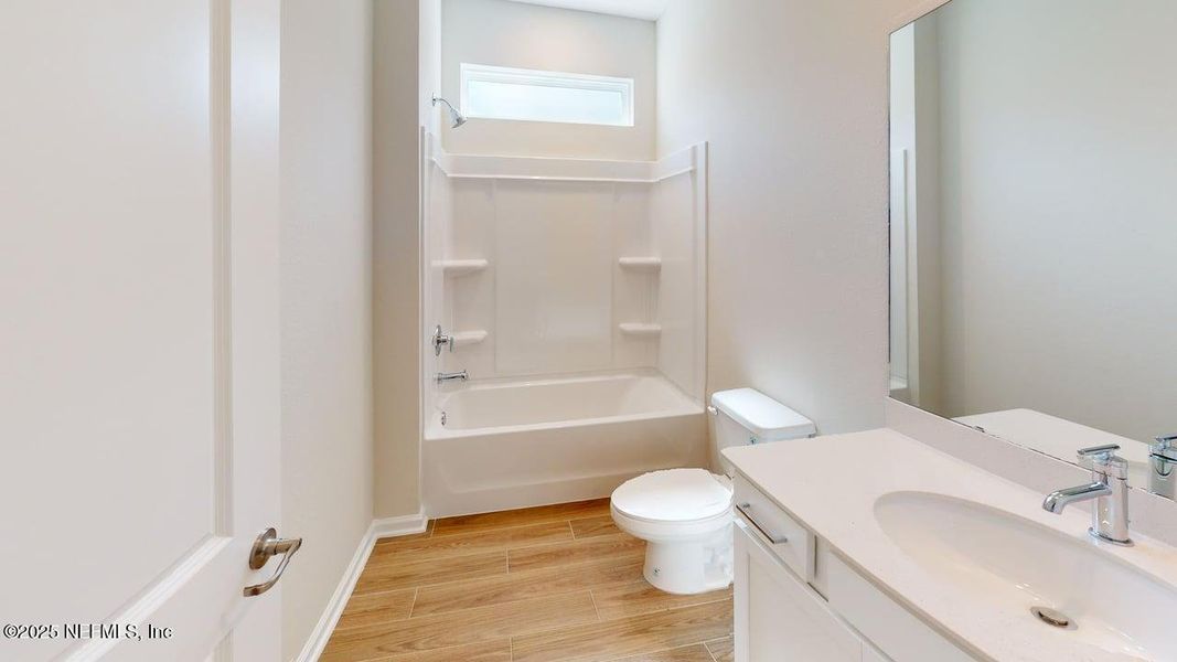 Furnished interior view inside a new home in Lakes at Bella Lago, Green Cove Springs (Image 5). Furnished interior view inside a new home in Lakes at Bella Lago, Green Cove Springs (Image 5).