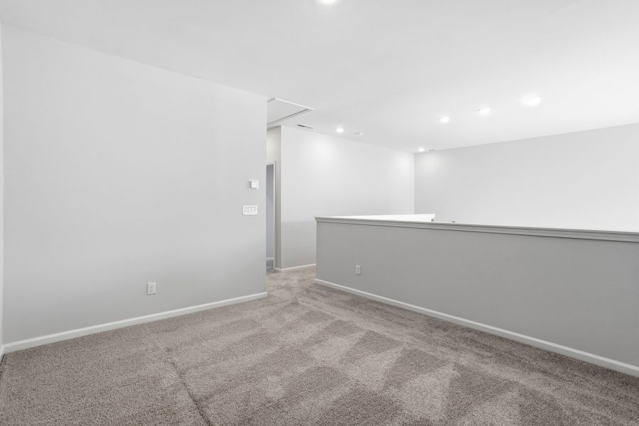 Spacious, unfurnished interior of a new home in Ovation at Sweetbrier, Durham (Image 26).