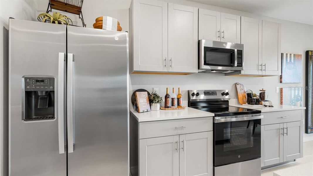 Furnished interior view inside a new home in Coasterra Community Group Page, Palmetto (Image 15).