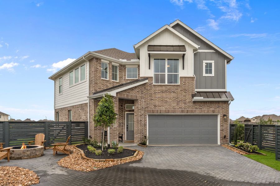 Front exterior of a new home in Bridgeland, Cypress, TX, highlighting curb appeal (Image 19). Front exterior of a new home in Bridgeland, Cypress, TX, highlighting curb appeal (Image 19).