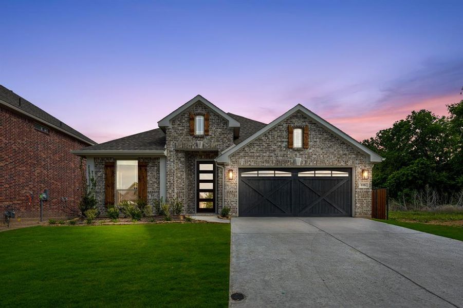 Front exterior of a new home in Parks of Aledo, Aledo, TX, highlighting curb appeal (Image 24).