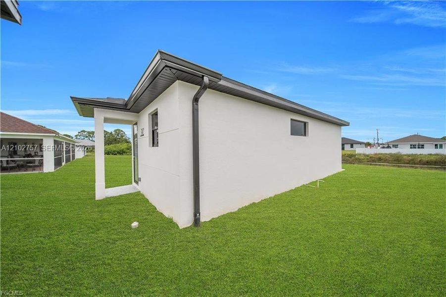 Exterior details and patio area of a home in , Lehigh Acres (Image 26).