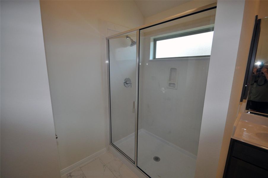 Spacious walk in shower in the Master Bath.