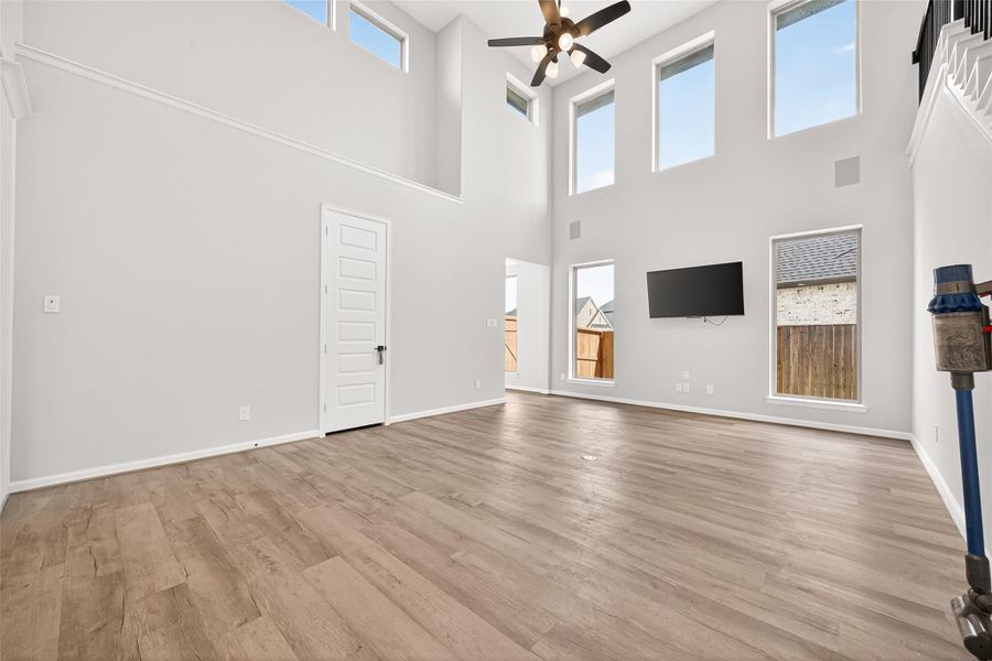 Spacious, unfurnished interior of a new home in Cane Island, Katy (Image 24).