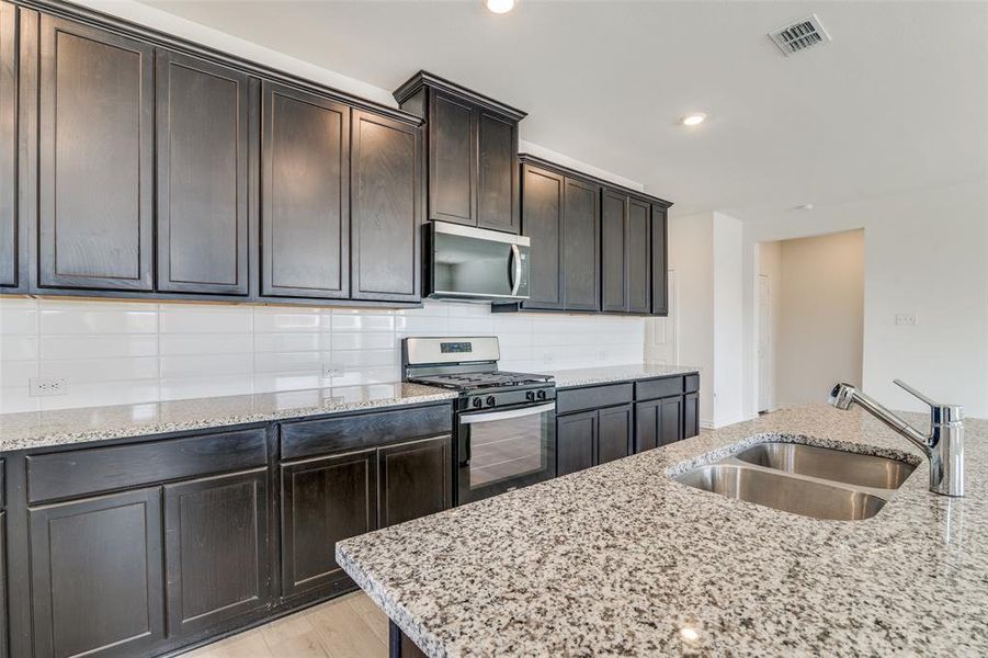 Furnished interior view inside a new home in Heartland Signature, Crandall (Image 5). Furnished interior view inside a new home in Heartland Signature, Crandall (Image 5).