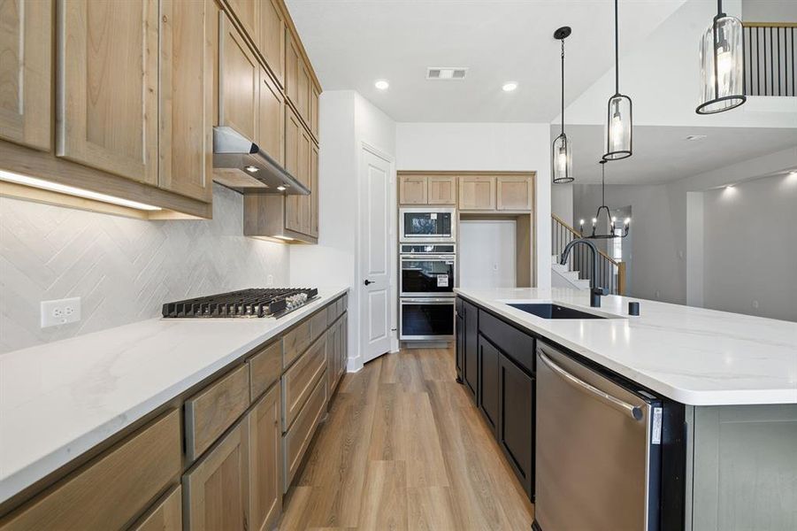 Furnished interior view inside a new home in Wildridge, Oak Point (Image 13).