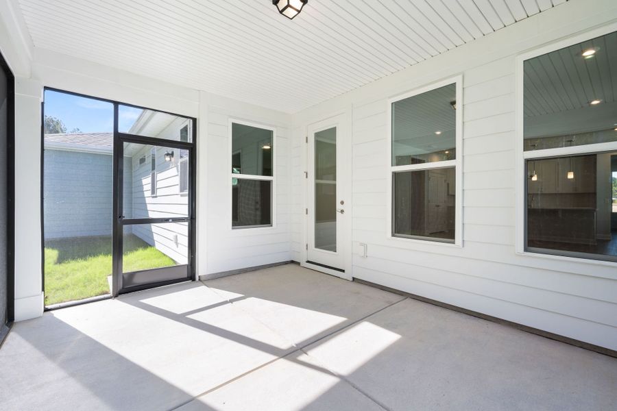 Exterior details and patio area of a home in Sun City Hilton Head, Bluffton (Image 2).