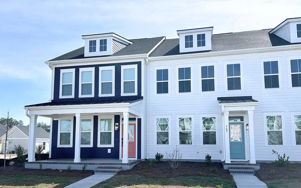 Front exterior of a new home in Nexton, Summerville, SC, highlighting curb appeal (Image 1). Front exterior of a new home in Nexton, Summerville, SC, highlighting curb appeal (Image 1).