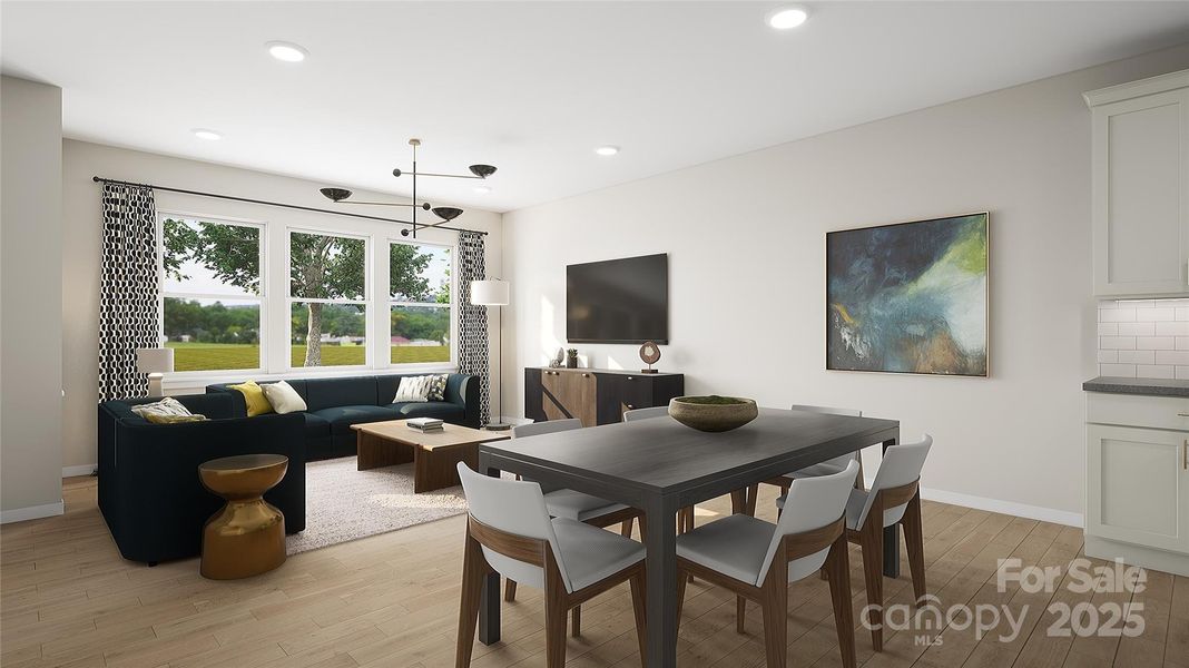 Dining Room Bridging Kitchen and Great Room. *Virtual Rendering | Actual Finishes, Structural Selections, and Orientation May Vary. Dining Room Bridging Kitchen and Great Room. *Virtual Rendering | Actual Finishes, Structural Selections, and Orientation May Vary.