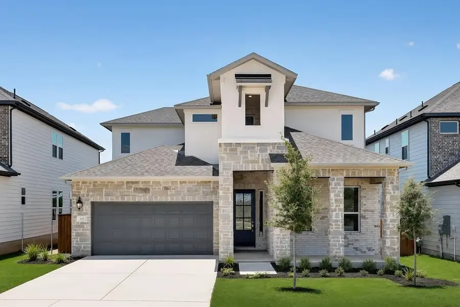 Representative exterior photo of a completed home built from the Windsor by Taylor Morrison in Easton Park, Austin, TX (Image 1). Representative exterior photo of a completed home built from the Windsor by Taylor Morrison in Easton Park, Austin, TX (Image 1).