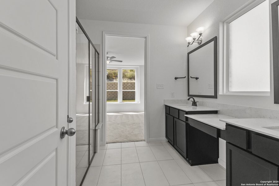 Furnished interior view inside a new home in Ladera 50', San Antonio (Image 12).