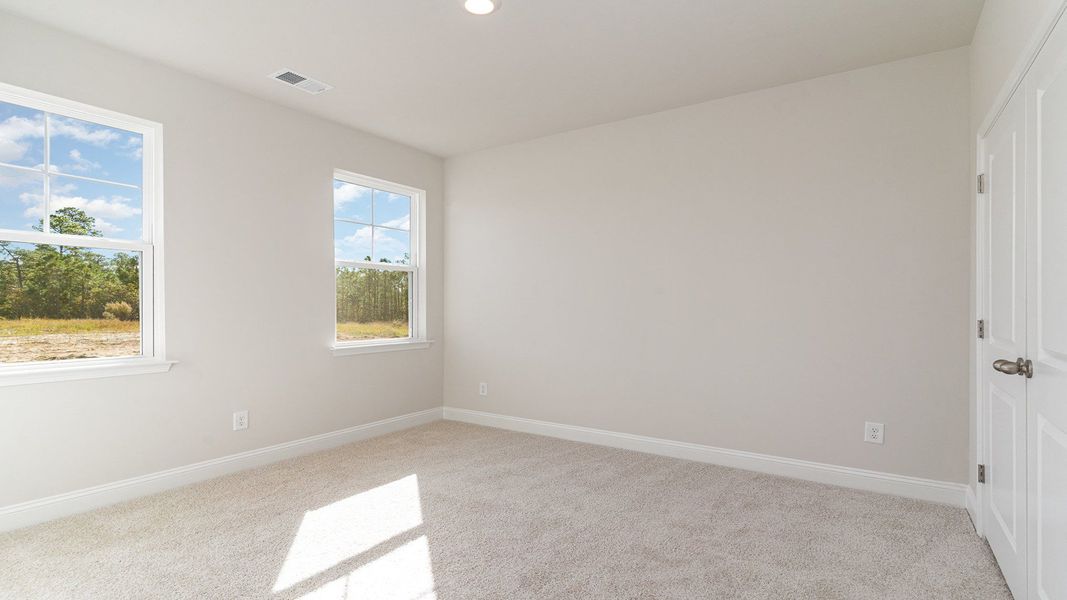Representative unfurnished interior of a home built from the EATON by D.R. Horton in Auberon Woods, Conway (Image 19).