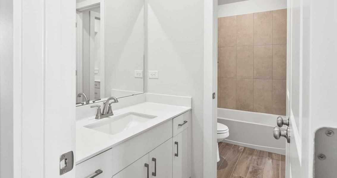 Furnished interior view inside a new home in Trace, San Marcos (Image 8).