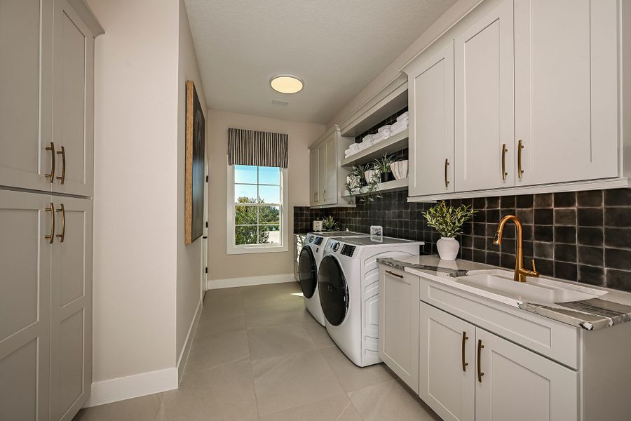 Representative furnished interior of a home built from the Key West II by Homes by WestBay in Oakfield, Parrish (Image 32).