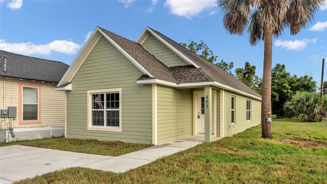 Front exterior of a new home in , Bartow, FL, highlighting curb appeal (Image 18). Front exterior of a new home in , Bartow, FL, highlighting curb appeal (Image 18).