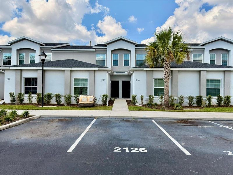 Front exterior of a new home in , Kissimmee, FL, highlighting curb appeal (Image 16). Front exterior of a new home in , Kissimmee, FL, highlighting curb appeal (Image 16).