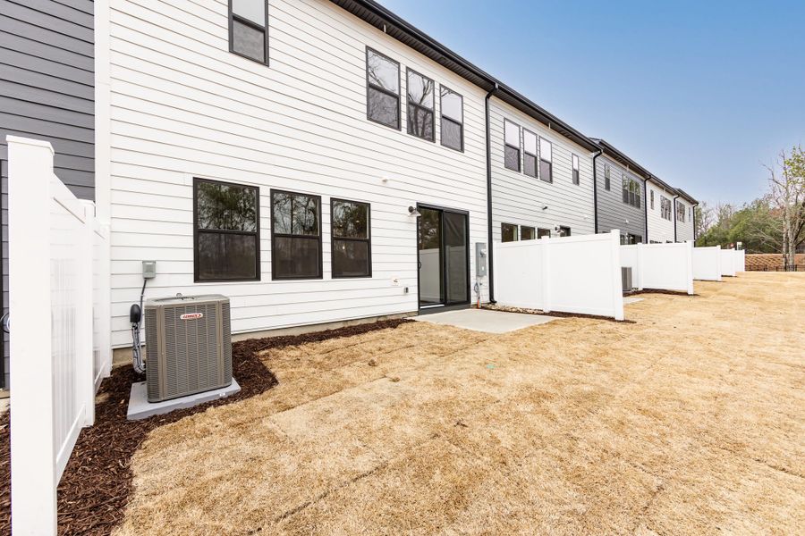 Exterior details and patio area of a home in Southbridge, Fort Mill (Image 26).