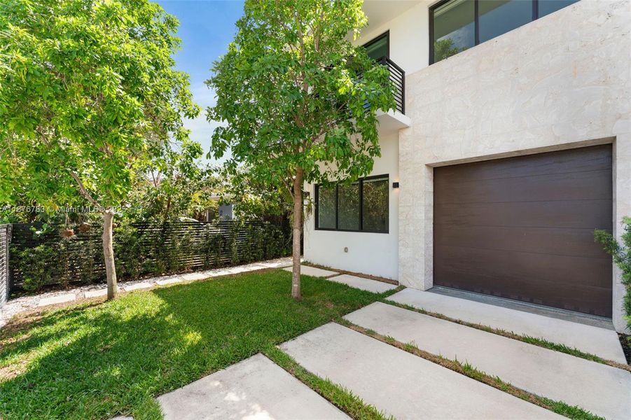 Front exterior of a new home in , Miami, FL, highlighting curb appeal (Image 21). Front exterior of a new home in , Miami, FL, highlighting curb appeal (Image 21).