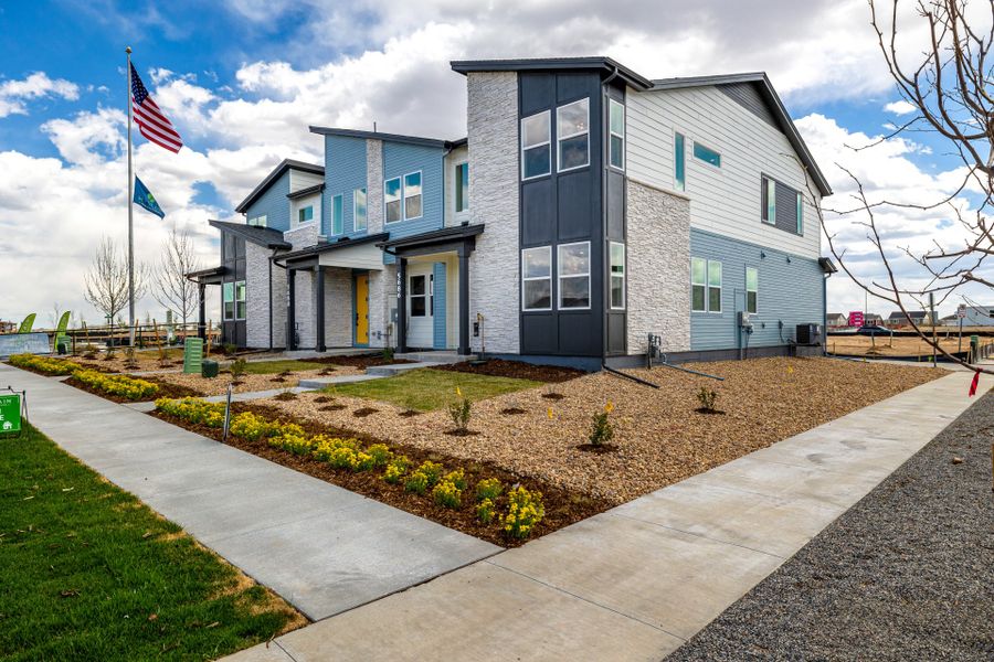 Front exterior of a new home in Painted Prairie, Aurora, CO, highlighting curb appeal (Image 23).