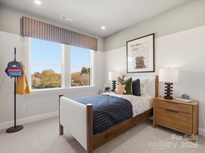 Bedroom Three Filled with Light. *Model Photos | Actual Finishes, Structural Selections, and Orientation May Vary.