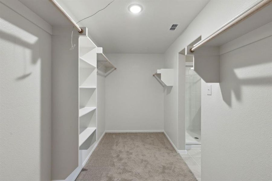 Primary Closet in the Harrison home plan by Trophy Signature Homes – REPRESENTATIVE PHOTO
