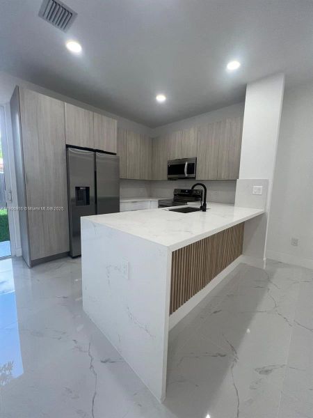 Furnished interior view inside a new home in , Miami (Image 6). Furnished interior view inside a new home in , Miami (Image 6).