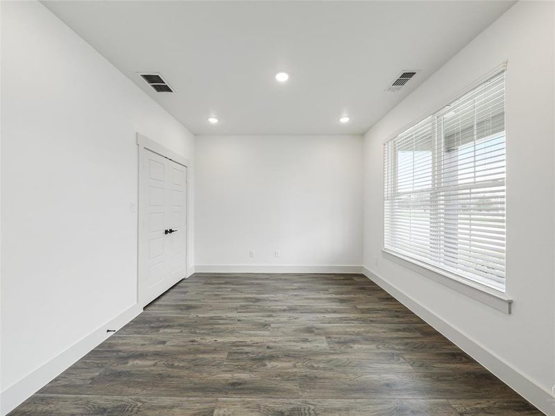 Study with recessed lighting and wood blinds Study with recessed lighting and wood blinds