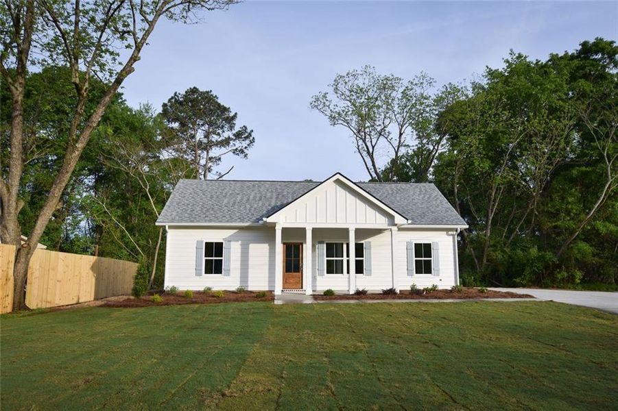 Front exterior of a new home in , Watkinsville, GA, highlighting curb appeal (Image 1). Front exterior of a new home in , Watkinsville, GA, highlighting curb appeal (Image 1).