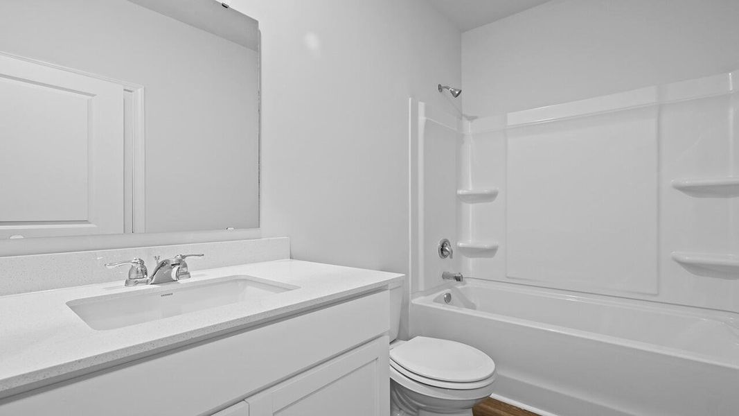 Furnished interior view inside a new home in Garbon Fields, Summerville (Image 6).