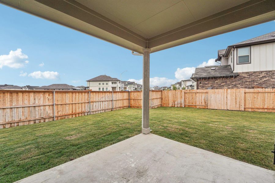 Exterior details and patio area of a home in Crosswinds, Kyle (Image 3).