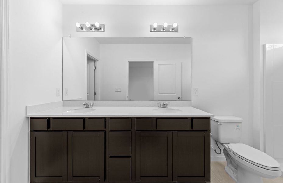 Furnished interior view inside a new home in Caloosa Cove, Labelle (Image 7).