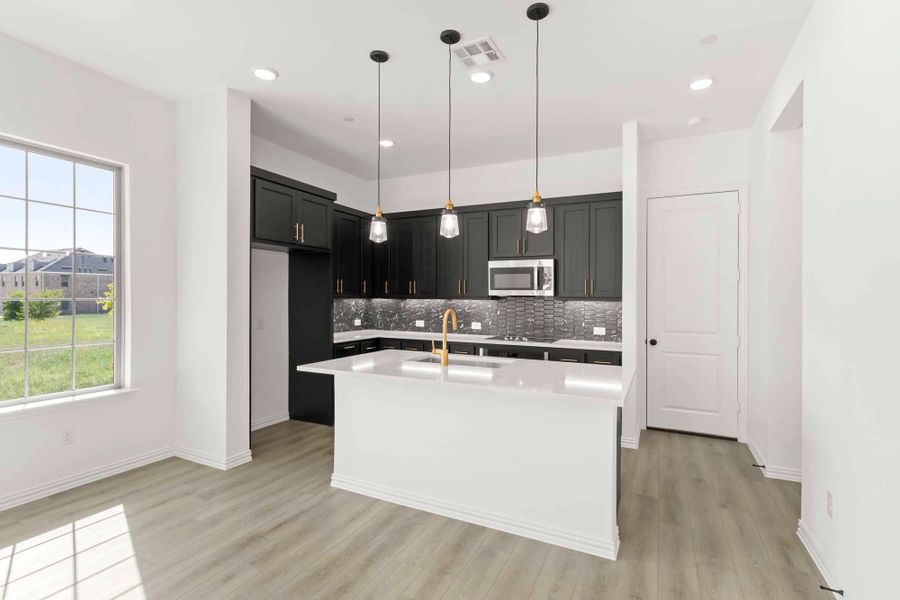 Kitchen featuring the Noir Collection Kitchen featuring the Noir Collection