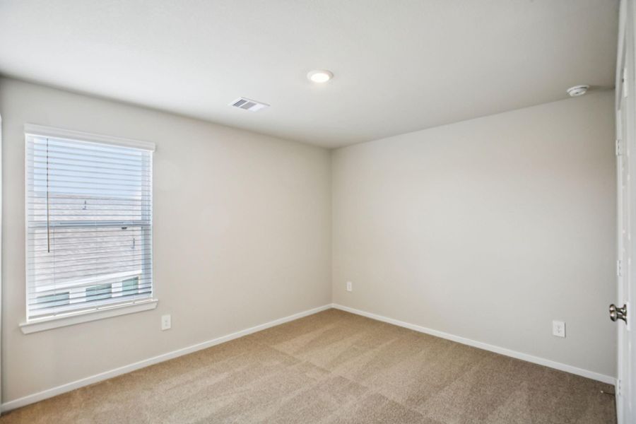 Spacious, unfurnished interior of a new home in Sanford Farms - Premier Series, Waller (Image 24).