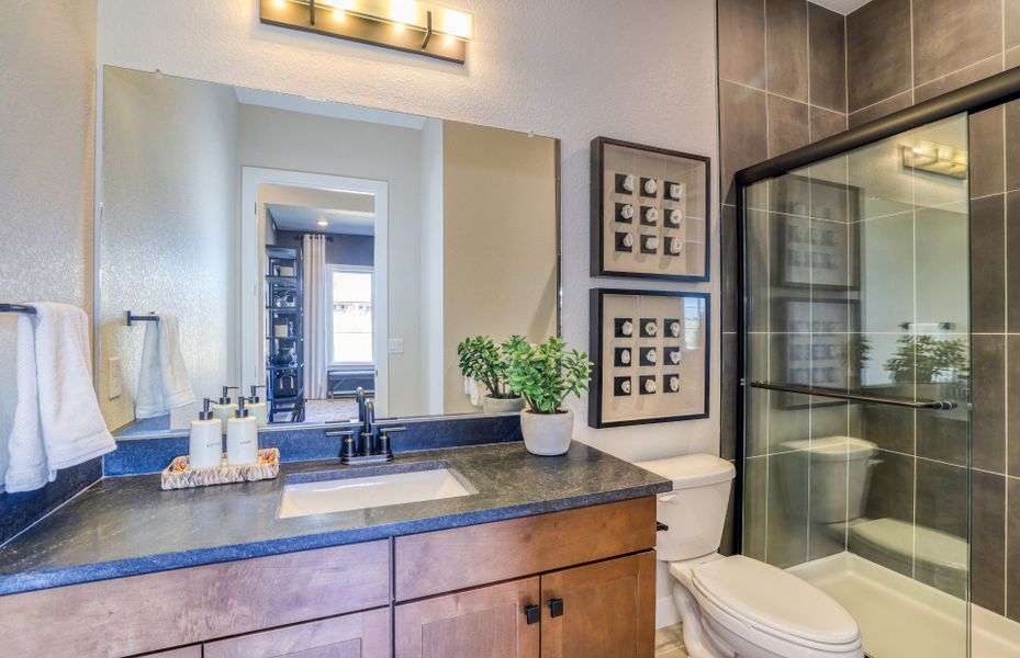 Furnished interior view inside a new home in Hilltop at Inspiration, Aurora (Image 20).