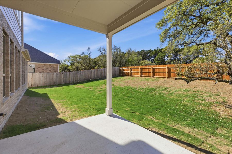 Exterior details and patio area of a home in Retreat at San Gabriel, Georgetown (Image 3).