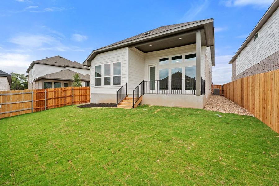 Exterior details and patio area of a home in Heritage, Dripping Springs (Image 3).