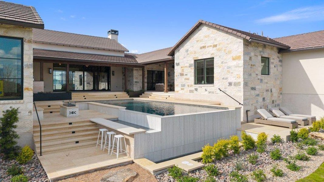Exterior details and patio area of a home in , Spicewood (Image 24).