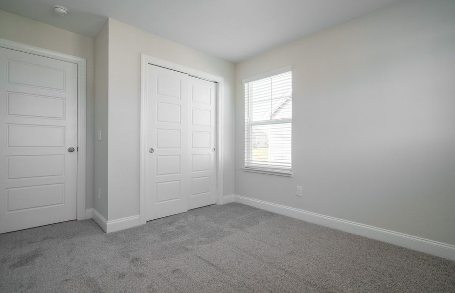 Representative unfurnished interior of a home built from the The Calle by Cothran Homes in Holly Ridge, Greenville (Image 28). Representative unfurnished interior of a home built from the The Calle by Cothran Homes in Holly Ridge, Greenville (Image 28).