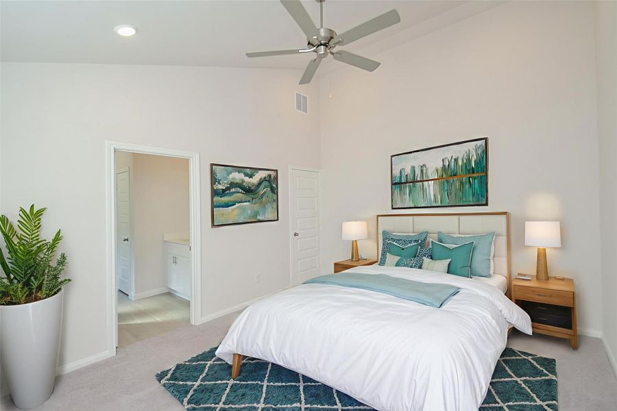 Natural light streams in through a large window, illuminating the neutral-toned walls and plush carpet. Natural light streams in through a large window, illuminating the neutral-toned walls and plush carpet.