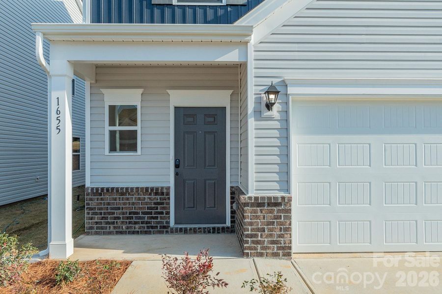 Exterior details and patio area of a home in Country Club Village, Salisbury (Image 3). Exterior details and patio area of a home in Country Club Village, Salisbury (Image 3).
