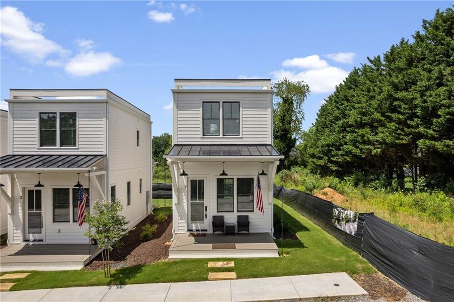 Front exterior of a new home in , Cleveland, GA, highlighting curb appeal (Image 1). Front exterior of a new home in , Cleveland, GA, highlighting curb appeal (Image 1).