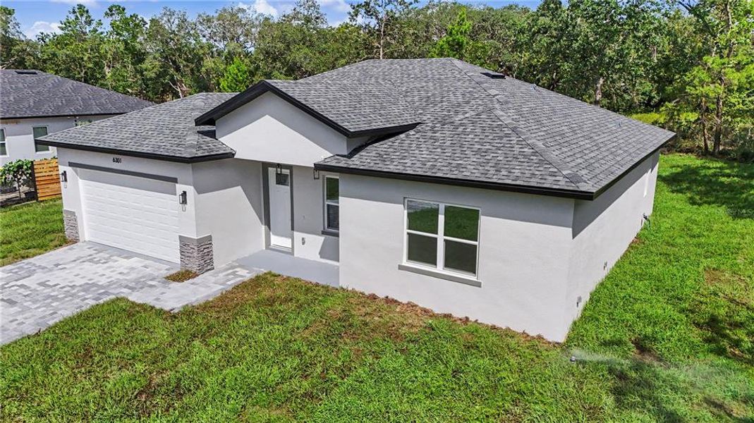 Exterior details and patio area of a home in , Ocala (Image 34).