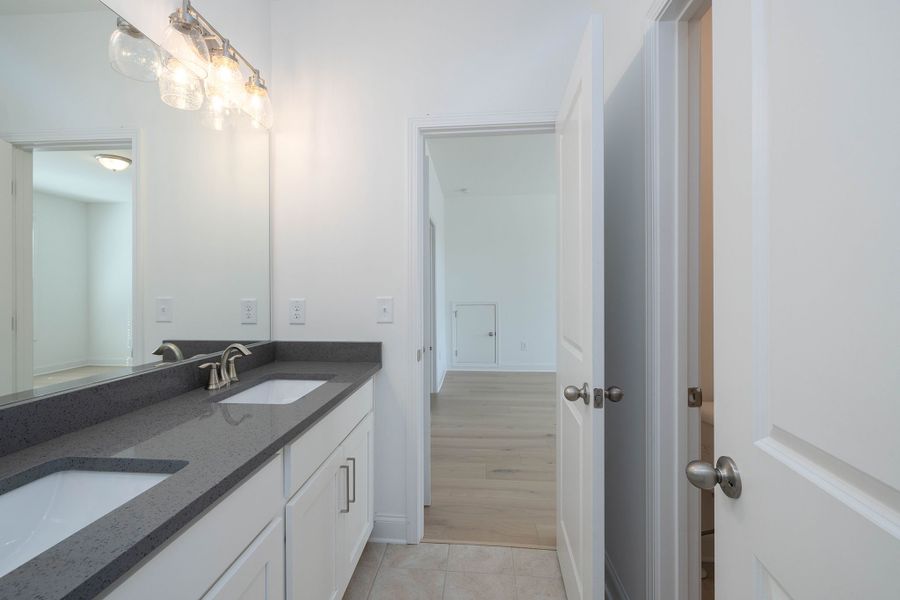 Dual vanities in bathroom connected bedroom #2 and #3