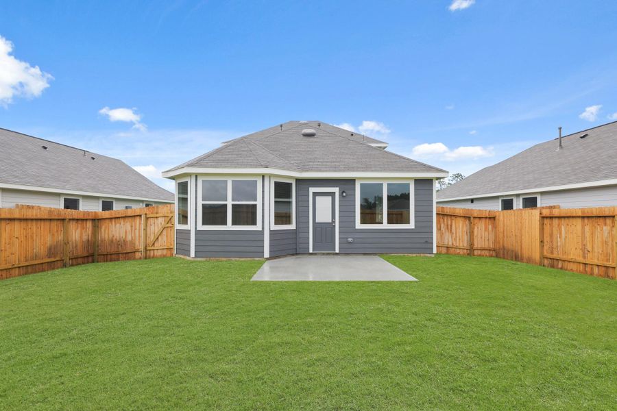 Front exterior of a new home in Townsend Reserve, Splendora, TX, highlighting curb appeal (Image 2). Front exterior of a new home in Townsend Reserve, Splendora, TX, highlighting curb appeal (Image 2).