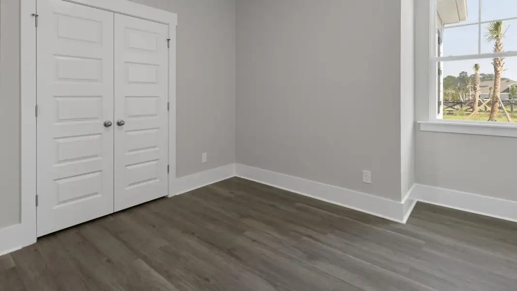 Spacious, unfurnished interior of a new home in The Retreat at Indigo Preserve Townhomes, Leland (Image 24).