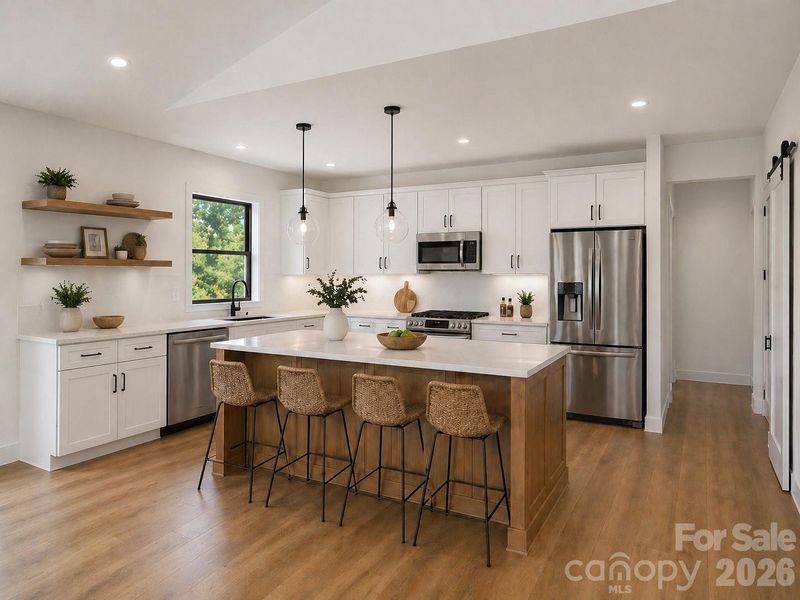 Open concept kitchen with center island providing extra seating creating an easy gathering space. (Virtually Staged) Open concept kitchen with center island providing extra seating creating an easy gathering space. (Virtually Staged)