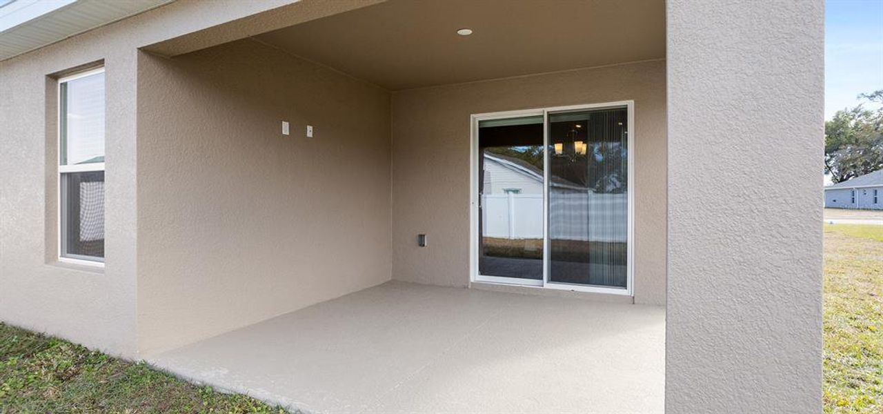 Exterior details and patio area of a home in Copperleaf, Ocala (Image 2).