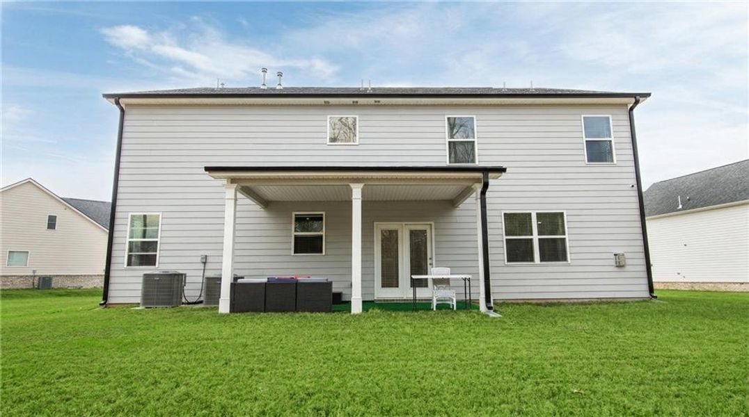 Exterior details and patio area of a home in Independence, Loganville (Image 3).