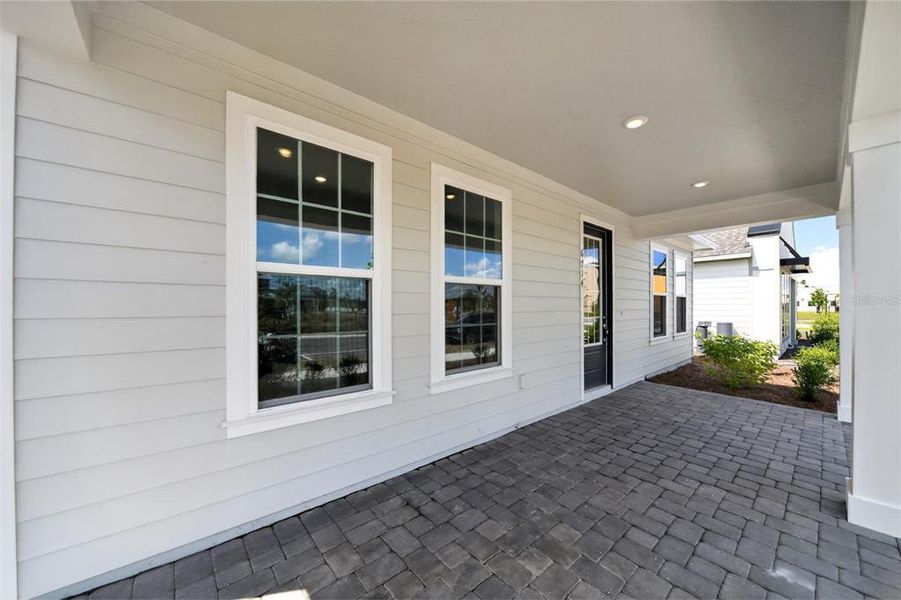 Exterior details and patio area of a home in Weslyn Park, St. Cloud (Image 4).
