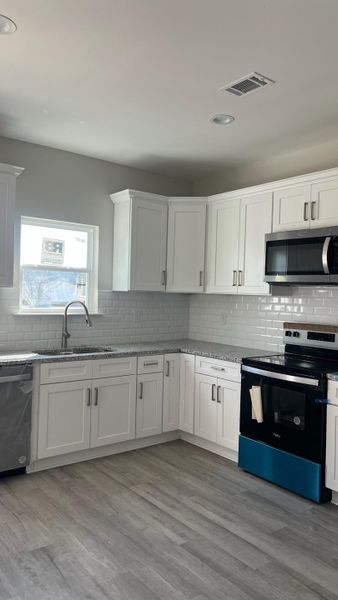 Furnished interior view inside a new home in , Santee (Image 3).